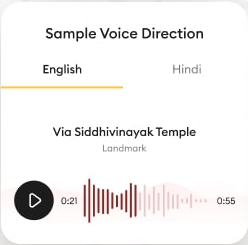 Pataa app screen — a recorded voice direction to a landmark, played back on a clean waveform, in English or Hindi